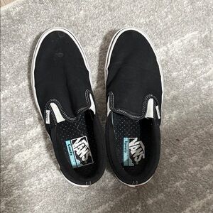 Vans Black Canvas Slip-Ons